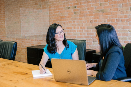 search firm and a client having a meeting.