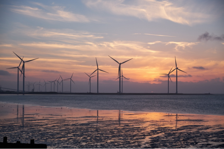 Wind turbines in an open field 